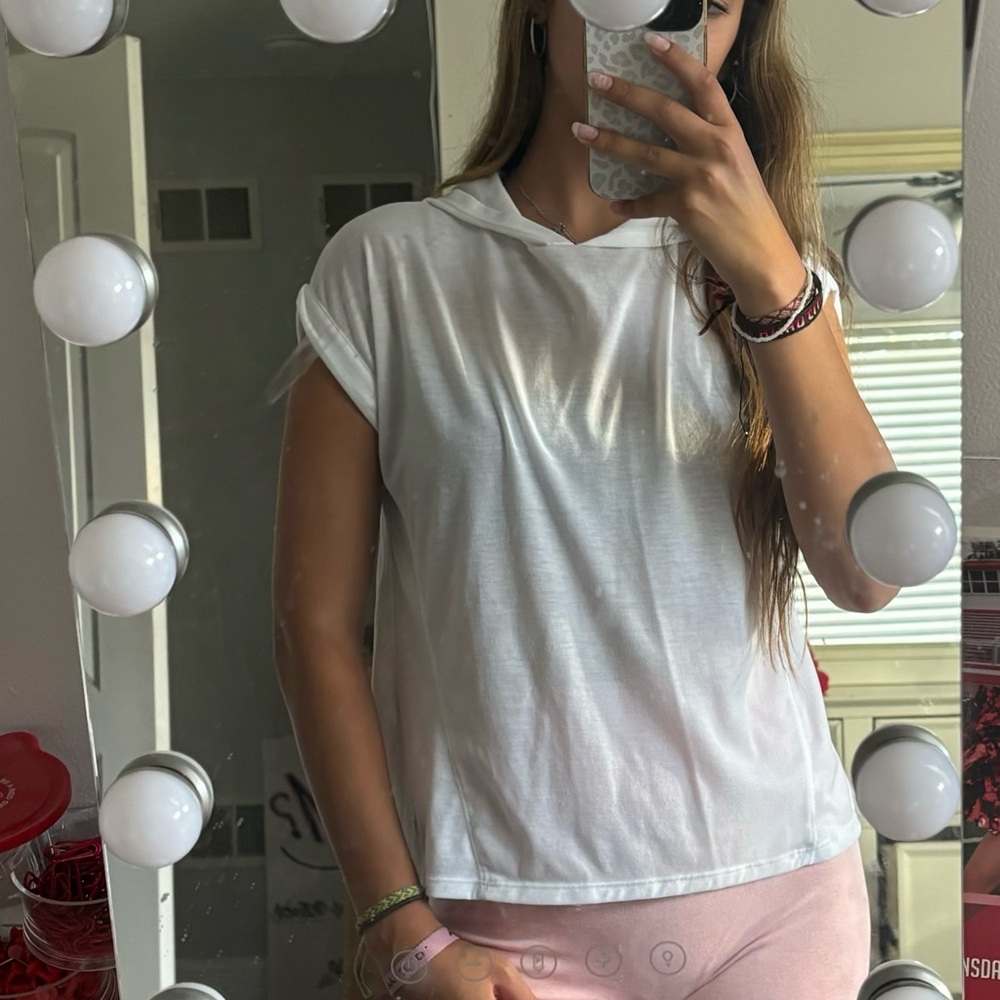 White hooded under armour athletic top